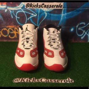 Jordan 11 low ie Rd/wht size 14